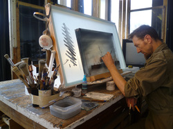 Portrait of Jeff Zimmer working at lightbox